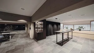 Brandnamic: Soluzioni hotel dagli esperti per il settore alberghiero Spazio moderno con tavoli, finestre e scaffali decorativi